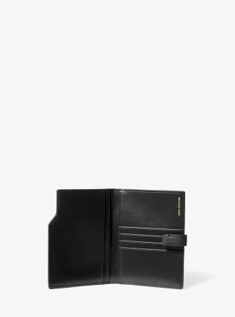 Portefeuille passeport en cuir grainé Jet Set